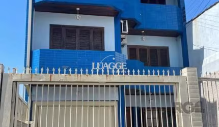 Casa 420m², 4 dormitórios, 3 vagas no bairro Partenon