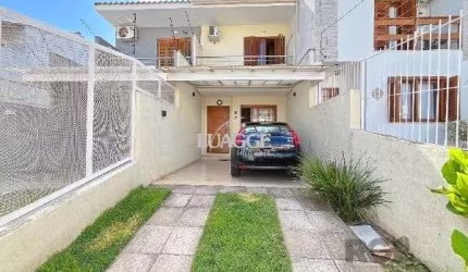 Casa em Porto Alegre, no bairro Guarujá, com 2 dormitório(s), e 2 banheiros, à venda.
