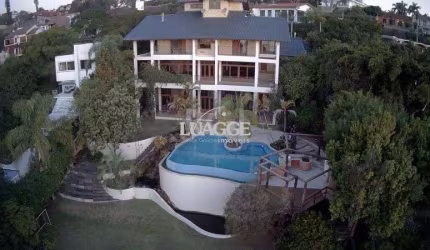 Casa com 4 dormitórios à venda, 1107 m² por R$ 3.700.000,00 - Vila Assunção - Porto Alegre/RS