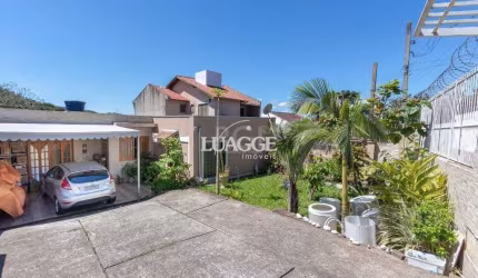 Casa para Venda - 370m², 4 dormitórios, sendo 1 suites, 6 vagas - Lomba do Pinheiro