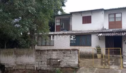 Casa 5 dormitórios, bairro Camaquã.