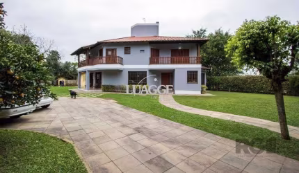 Sobrado com 6 suites, lareira, lavabo, pátio - Bairro Belém Velho