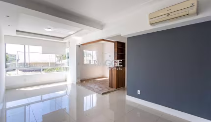 Apartamento de 3 dormitórios, transformado em dois, 1 suíte, living para 2 ambientes, cozinha com churrasqueira, área de serviço, banheiro social e 1 vaga de garagem.