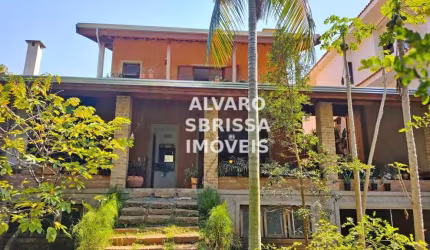 Casa canto dos pássaros, com 4 suítes e mais um quarto reversível. salas de jantar, lareira e estar cozinha e lavanderia escritorio. 480m2.at 380m2.ac