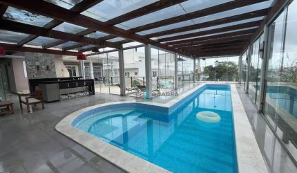 Espetacular casa em condomínio fechado, com piscina aquecida e salão de festas