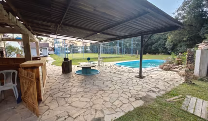 Oportunidade de terreno amplo com  casa incrível
