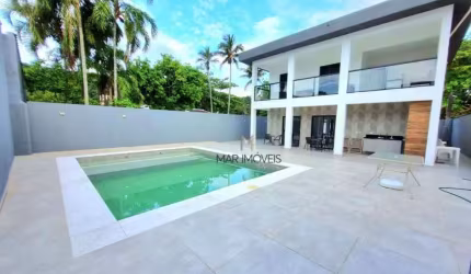 Casa Totalmente reformada em condomínio fechado na praia de Pernambuco no Guarujá!