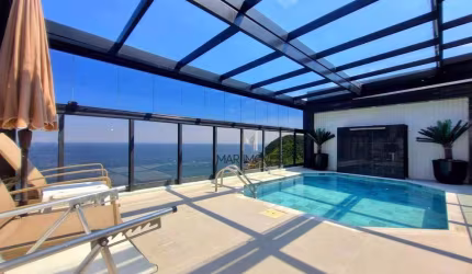 ESPETACULAR cobertura duplex toda reformada a 100 metros da praia!