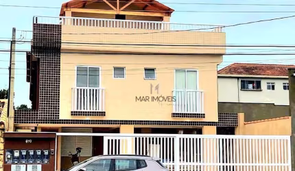 Casa sobreposta com 2 dormitórios à venda, 95 m² por R$ 445.000 - Vila Ligya - Guarujá/SP