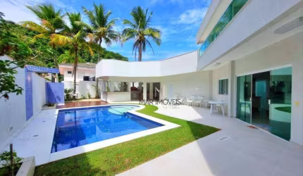 Linda casa com 5 suítes em condomínio fechado de alto padrão na praia de Pernambuco no Guarujá!