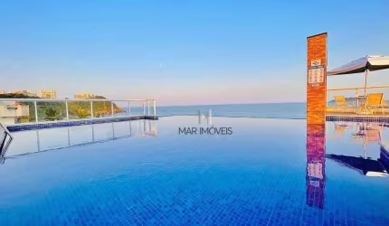 Apartamento a 50 metros da praia do Tombo no Guarujá com varanda gourmet, excelente localização!