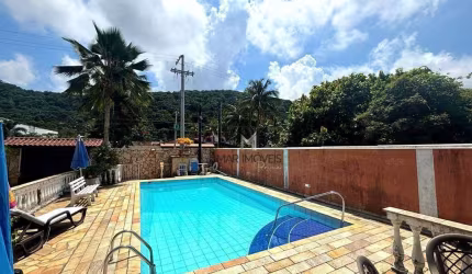 Casa com 4 dormitórios à venda, 200 m² por R$ 1.400.000,00 - Jardim Guaiuba - Guarujá/SP