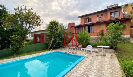Casa com 3 dormitórios à venda, 300 m² por R$ 2.800.000,00 - Cacupé - Florianópolis/SC