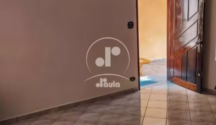 Vila Bela Vista. CASA TÉRREA com 115m2, 2 dormitórios, 1 banheiro, quintal e 2 vagas de garagem.