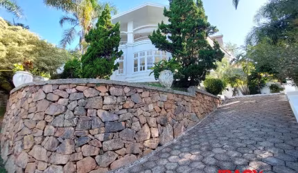 Casa em condomínio fechado com 4 quartos para alugar na Rua das Laranjeiras, 1122, Roçado, São José, 480 m2 por R$ 12.500