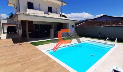 Casa com 4 dormitórios à venda, 360 m² por R$ 1.700.000,00 - Jardim Britânia - Caraguatatuba/SP
