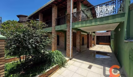 Casa com 3 dormitórios à venda, 411 m² por R$ 1.200.000,00 - Indaiá - Caraguatatuba/SP