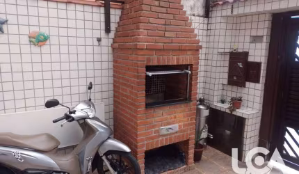 Casa com 2 dormitórios à venda por R$ 585.000 - Macuco - Santos/SP