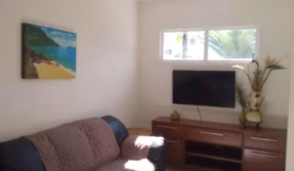 CASA DENTRO DE CONDOMINIO NA PRAIA GRANDE.