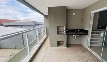 APARTAMENTO COM 2 SUÍTES E VARANDA GOURMET NO CENTRO.