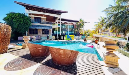Casa com 9 dormitórios à venda, 2000 m² por R$ 12.000.000,00 - Porto das Dunas -