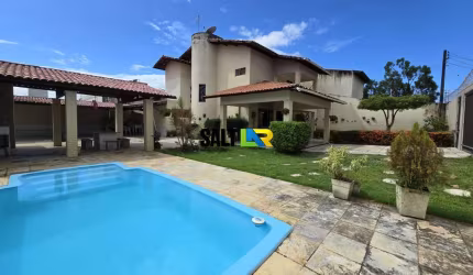 Casa com 3 dormitórios à venda, 169 m² por R$ 790.000 - José de Alencar - Fortal