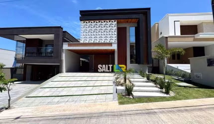 Casa com 4 dormitórios à venda, 242 m² por R$ 1.700.000 - Cidade Alpha - Eusébio/CE