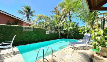 Casa no Guarujá, Condomínio Fechado, Jardim Pernambuco II, 4 suítes.