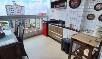 Apartamento mobiliado com varanda gourmet com 2 dormitórios à venda na Vila Tupi - Praia Grande/SP