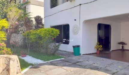 Casa com 3 dormitórios à venda, 420 m² por R$ 1.300.000,00 - Tombo - Guarujá/SP