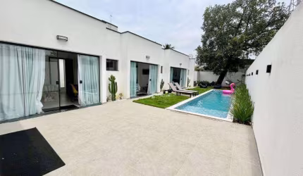 Casa com 3 dormitórios à venda, 158 m² por R$ 1.250.000,00 - Praia de Pernambuco - Guarujá/SP
