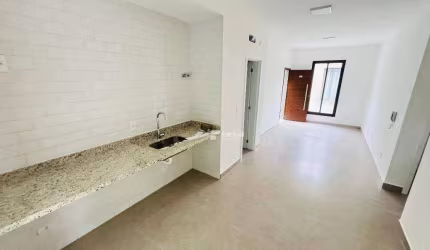 Village com 2 dormitórios à venda, 68 m² - Riviera de São Lourenço - Bertioga/SP