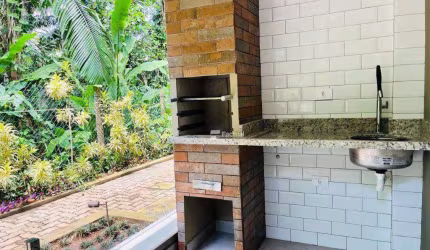 Village com 2 dormitórios à venda, 68 m² - Riviera de São Lourenço - Bertioga/SP