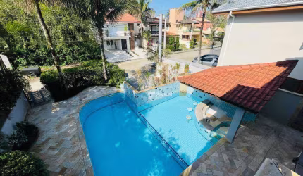 Casa com 6 dormitórios à venda, 296 m² por R$ 5.750.000,00 - Riviera de São Lourenço - Bertioga/SP