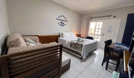 Village com 1 dormitório à venda, 46 m²  - Riviera de São Lourenço - Bertioga/SP