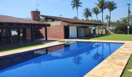 Casa com 4 dormitórios à venda, 465 m² por R$ 4.300.000,00 - Acapulco - Guarujá/SP