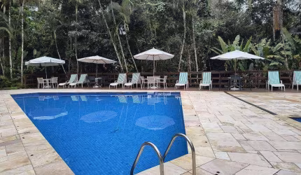 Village com 2 dormitórios à venda, 68 m² - Riviera de São Lourenço - Bertioga/SP