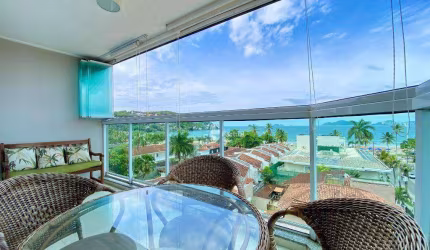 Apartamento na Enseada 3 quartos com varanda gourmet e vista para o mar.