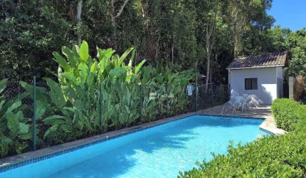 Village com 2 dormitórios à venda, 72 m² - Riviera de São Lourenço - Bertioga/SP