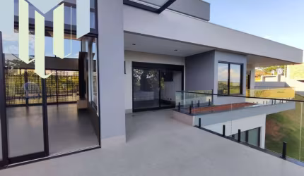 Casa á venda condomínio Portal da Serra com 04 suítes, escritório, toda automatizada ,vista para o vale, acabamento impecável.