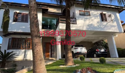 SOBRADO EM CONDOMINIO 4 QUARTOS 3 SUITES 5BANHEIROS 4 VAGAS  PISCINA SALAO DE FESTA FL55