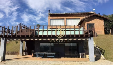 Casa com 3 dormitórios, 790 m² - venda por R$ 4.500.000,00 ou aluguel por R$ 20.018,46/mês - Chácaras Cataguá - Taubaté/SP