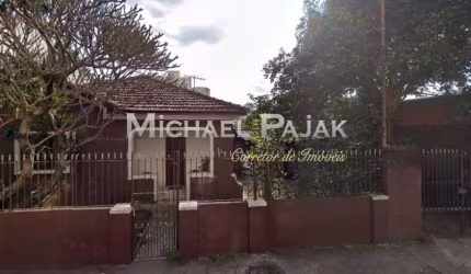 Terreno composto por uma casa, uma oficina mecânica, um restaurante e uma pizzaria delivery