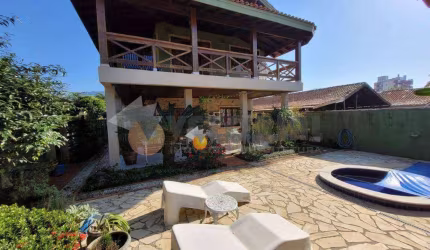 Sobrado com 4 dormitórios à venda, 437 m² por R$ 1.900.000,00 - Jardim Capricórnio - Caraguatatuba/SP
