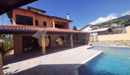 Sobrado com 4 dormitórios à venda, 370 m² por R$ 2.000.000,00 - Pr Arrastão - São Sebastião/SP