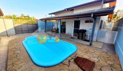 Casa com 3 dormitórios à venda, 132 m² por R$ 750.000 - Massaguaçu - Caraguatatuba/SP