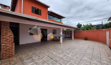 Sobrado com 3 dormitórios à venda, 176 m² por R$ 600.000,00 - Getuba - Caraguatatuba/SP