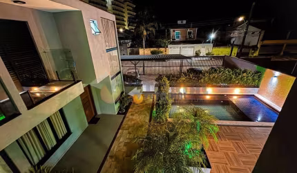 Sobrado com 3 dormitórios à venda, 111 m² por R$ 750.000,00 - Cidade Jardim - Caraguatatuba/SP