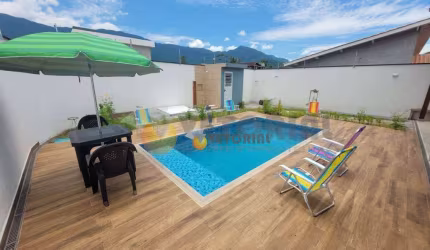 Casa com 3 dormitórios à venda, 210 m² por R$ 1.100.000,00 - Massaguaçu - Caraguatatuba/SP
