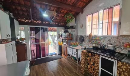 Sobrado com 3 dormitórios à venda, 244 m² por R$ 490.000 - Porto Novo - Caraguatatuba/SP